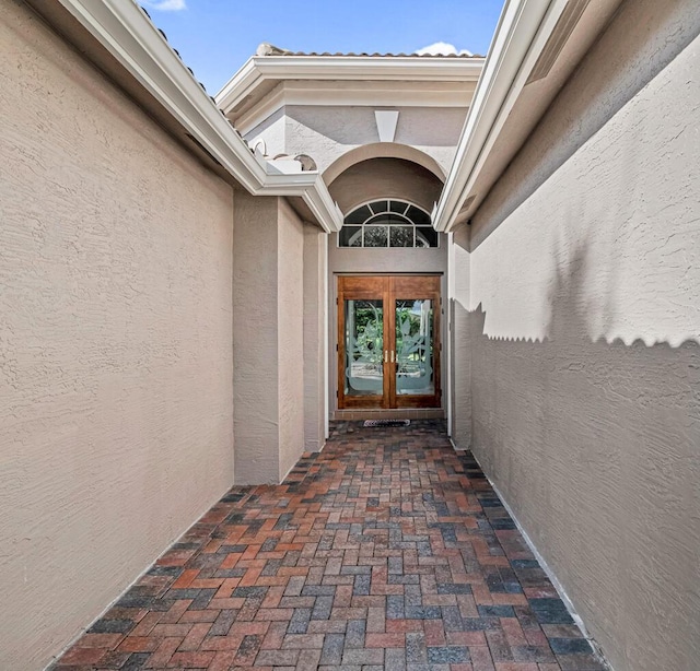 doorway to property featuring french doors