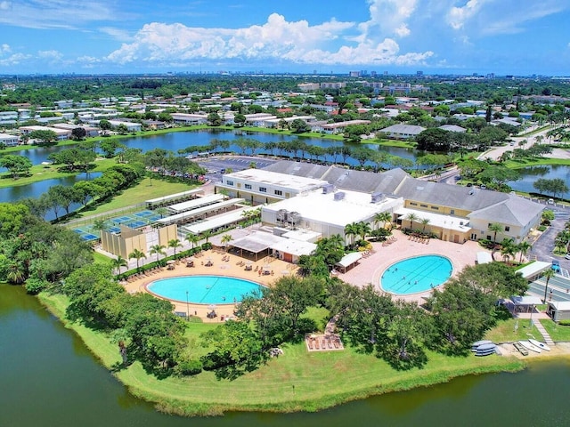 bird's eye view with a water view