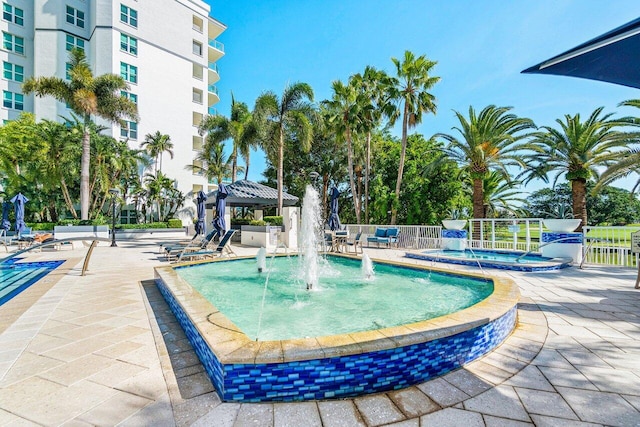 view of swimming pool with a gazebo