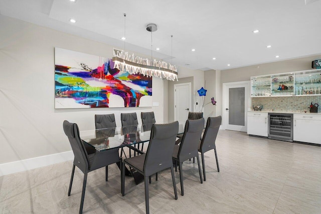 dining area with bar and wine cooler