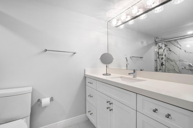 bathroom featuring toilet, an enclosed shower, tile patterned floors, and vanity