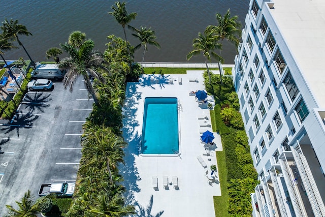 birds eye view of property featuring a water view