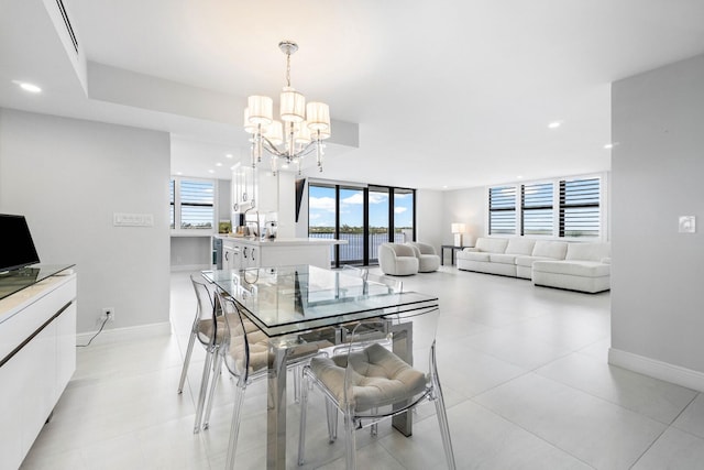 dining room with a chandelier