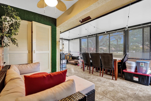 sunroom / solarium with ceiling fan