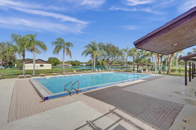 view of swimming pool featuring a patio area