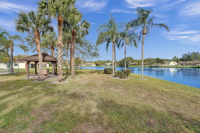 view of yard featuring a gazebo and a water view