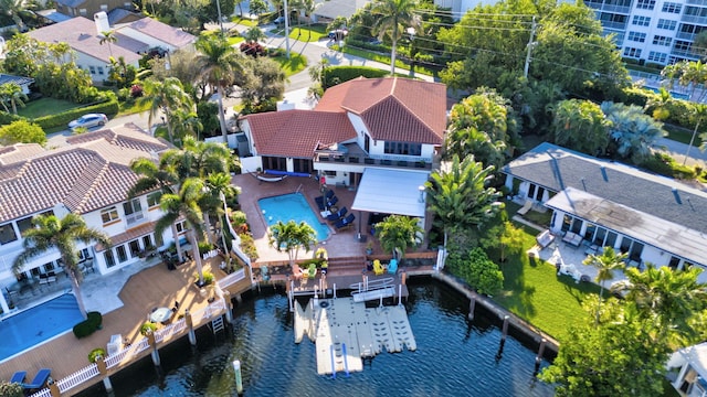 birds eye view of property featuring a water view