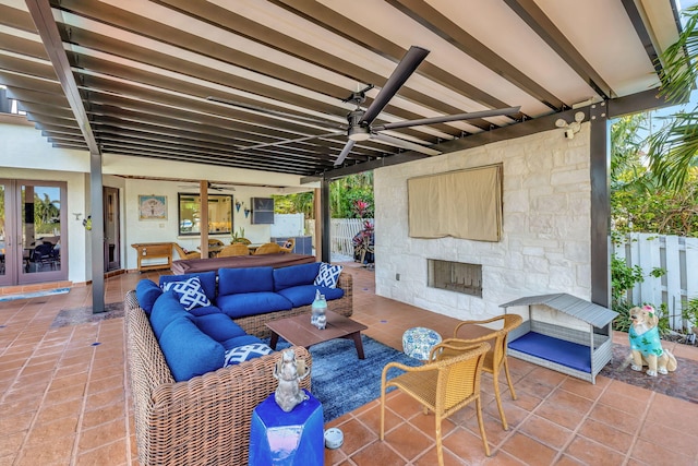 view of patio / terrace with ceiling fan and an outdoor hangout area