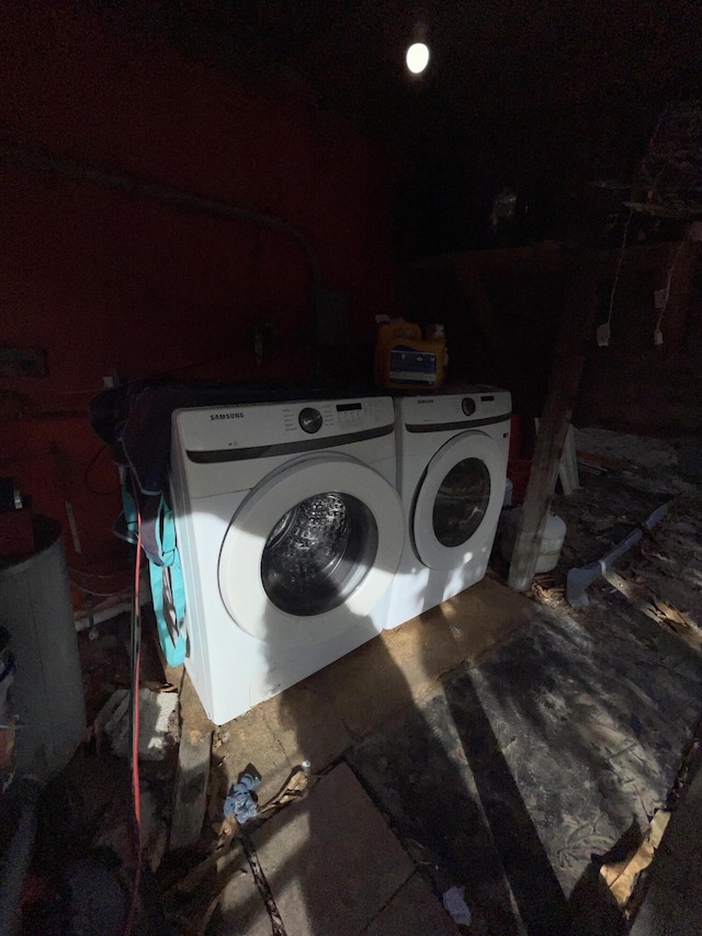 clothes washing area with washer and dryer