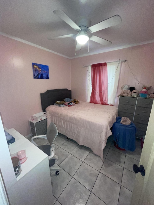 bedroom featuring ceiling fan, crown molding, and light tile patterned flooring