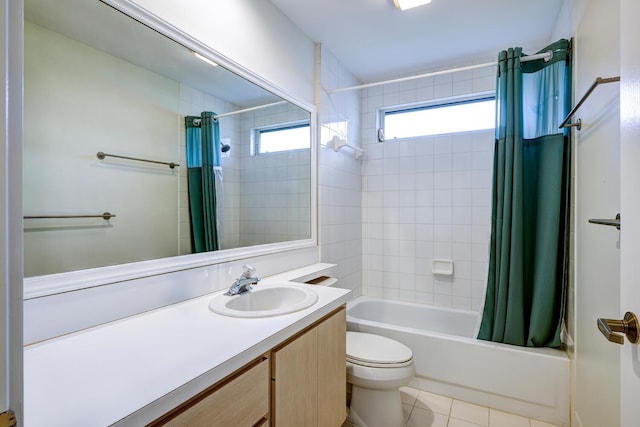 full bathroom featuring tile patterned floors, vanity, shower / bath combination with curtain, and toilet