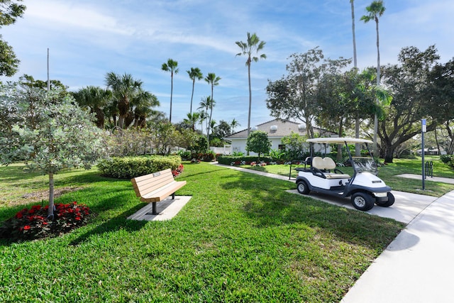 view of home's community featuring a lawn