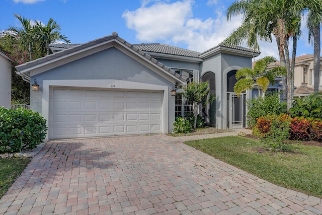 view of front of home with a garage