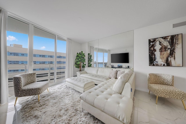 living room with a wall of windows