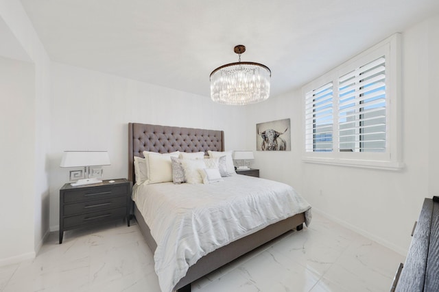 bedroom with a chandelier