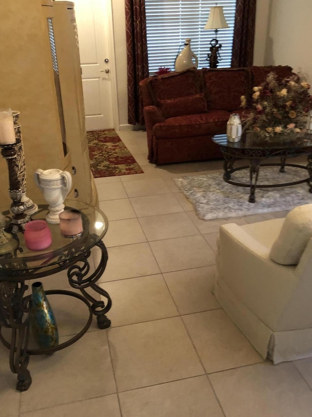 living room with light tile patterned flooring