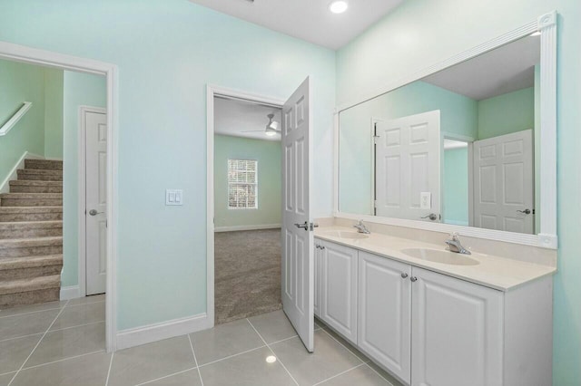 bathroom featuring ceiling fan, tile patterned flooring, and vanity