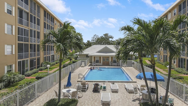 view of swimming pool with a patio