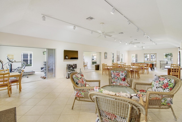 interior space featuring ceiling fan and light tile patterned flooring