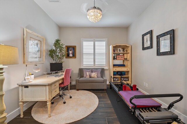 office area featuring a notable chandelier