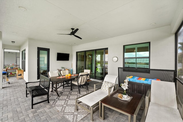 view of patio / terrace with outdoor lounge area and ceiling fan