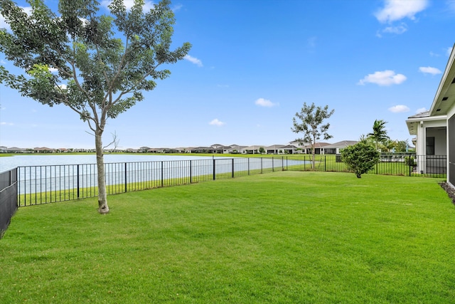 view of yard with a water view