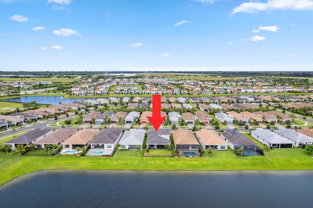 drone / aerial view featuring a water view