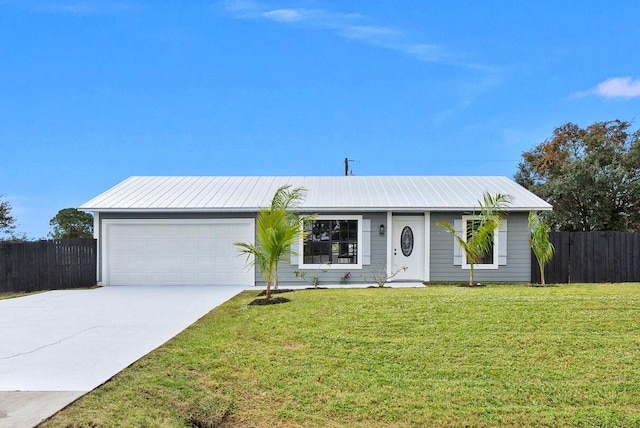 ranch-style home featuring a front lawn and a garage