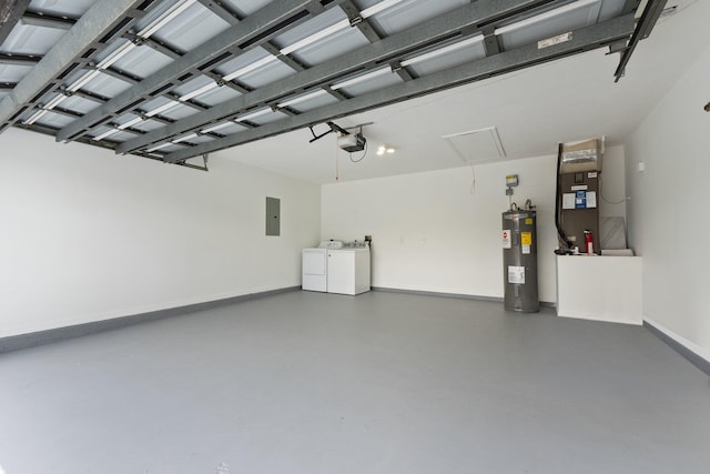 garage featuring electric water heater, electric panel, a garage door opener, washer and dryer, and heating unit