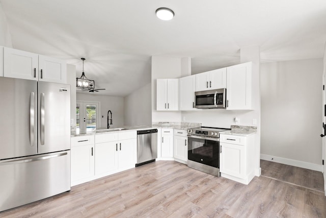 kitchen with white cabinetry, sink, ceiling fan, and appliances with stainless steel finishes