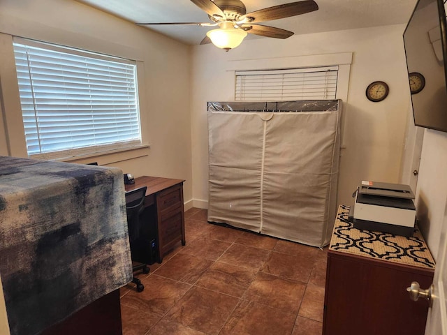 bedroom featuring ceiling fan