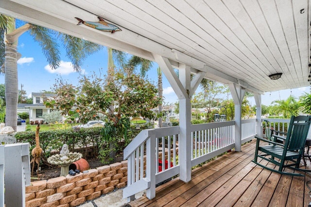 wooden terrace featuring a porch