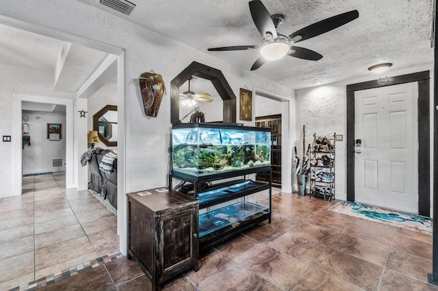 living room featuring a textured ceiling