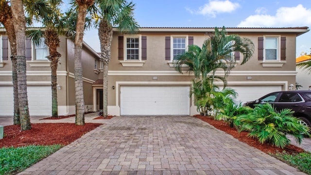 view of front of home with a garage