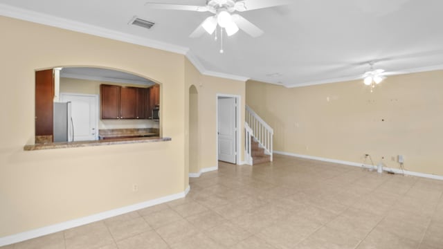 unfurnished living room with crown molding and ceiling fan