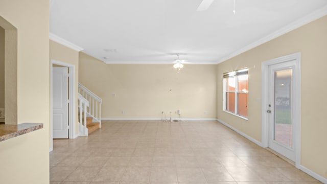 unfurnished room featuring ceiling fan and ornamental molding