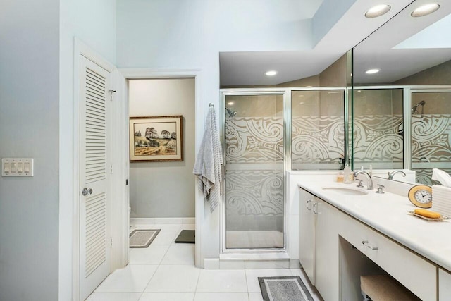 bathroom with vanity and tile patterned floors