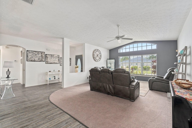 living room featuring carpet flooring, a textured ceiling, ceiling fan, and lofted ceiling