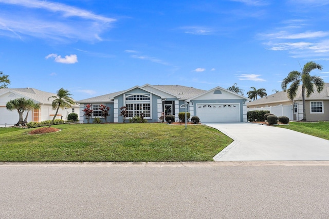 single story home with a garage and a front lawn