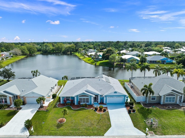 birds eye view of property with a water view