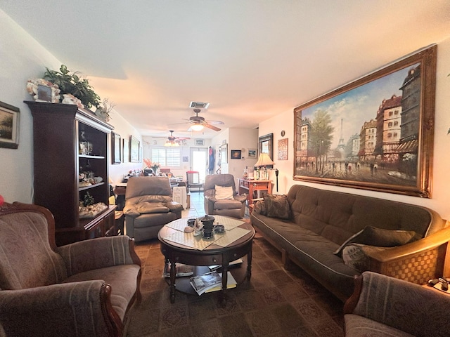 living room featuring ceiling fan