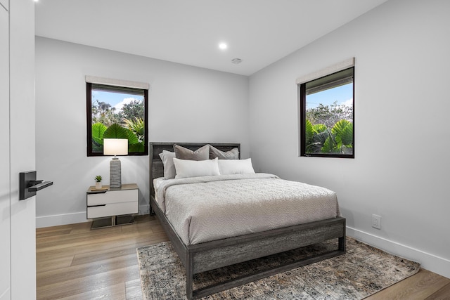 bedroom featuring light hardwood / wood-style floors