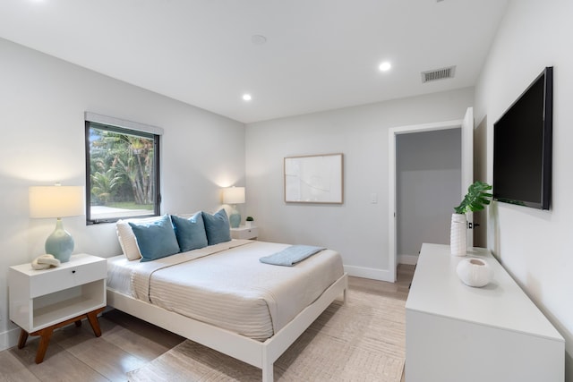 bedroom featuring hardwood / wood-style flooring