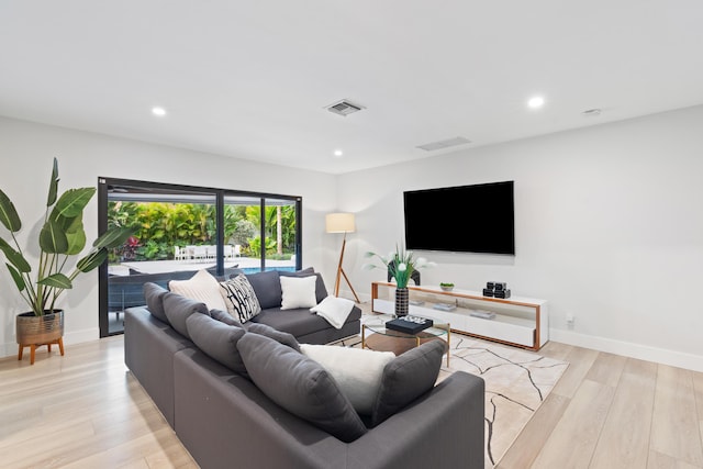 living room featuring light wood-type flooring