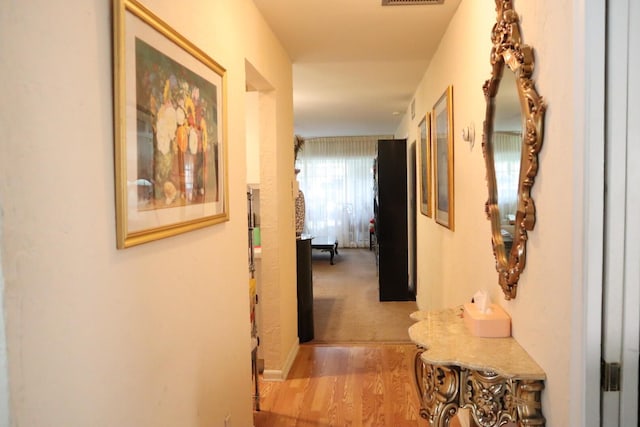 hall featuring light hardwood / wood-style flooring