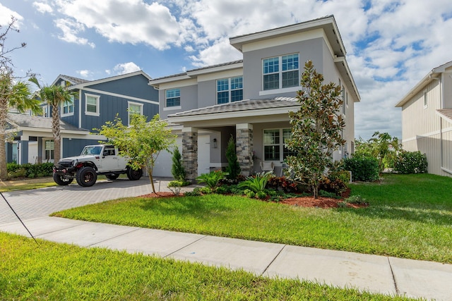 view of front of home featuring a front lawn