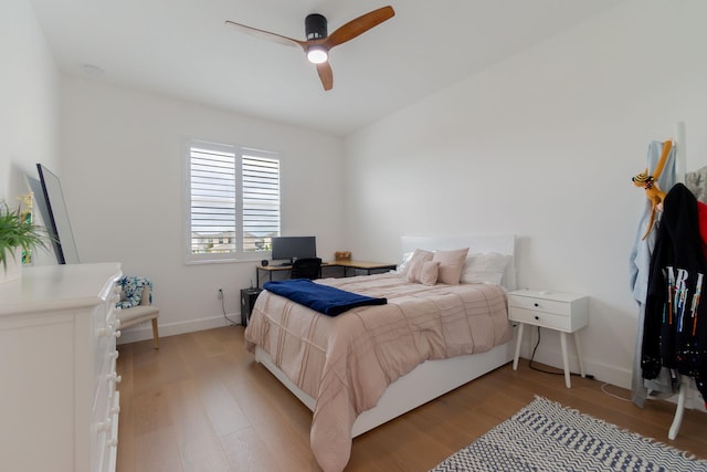 bedroom featuring ceiling fan and light wood-type flooring