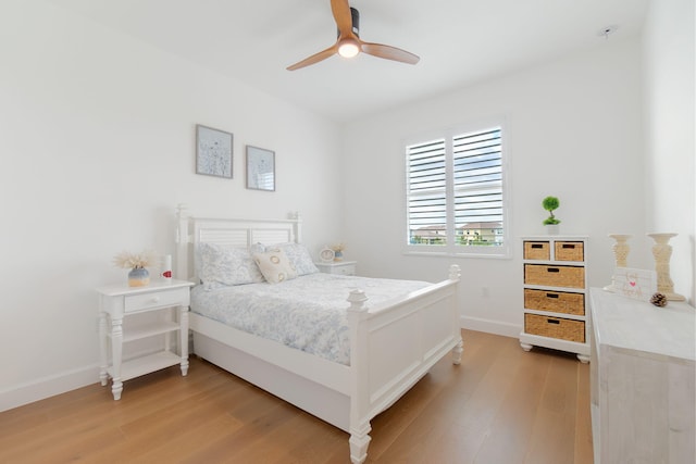 bedroom featuring light hardwood / wood-style flooring and ceiling fan