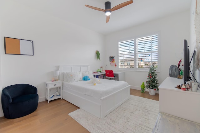 bedroom featuring ceiling fan and light hardwood / wood-style floors