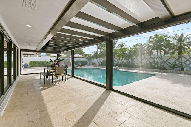 view of swimming pool with a patio area